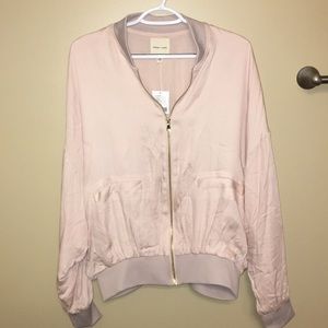 Urban Outfitters pink satin bomber